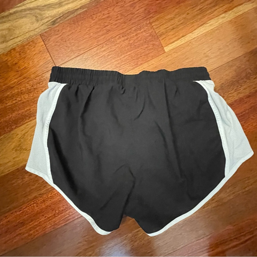 Under Armour Women's Black Shorts with White Trim - Picture 2 of 3